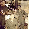 Christmas cheer 1970: Lt. Terry Harvick (left), Scott Krueger (seated) and Les Higa (right).